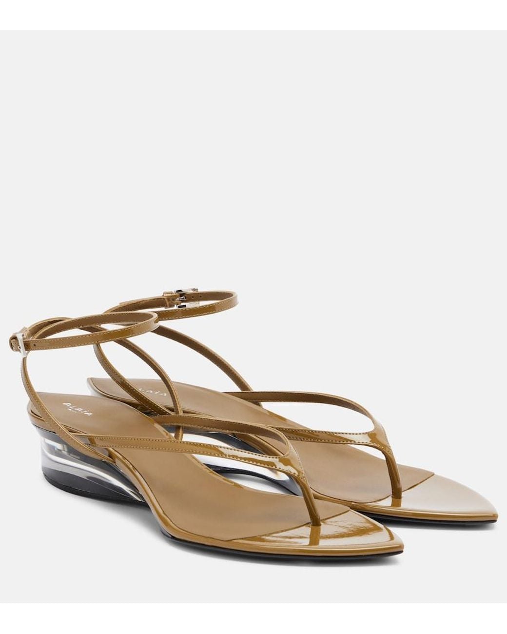 Alaïa Metallic Invisible Patent Leather Wedge Thong Sandals