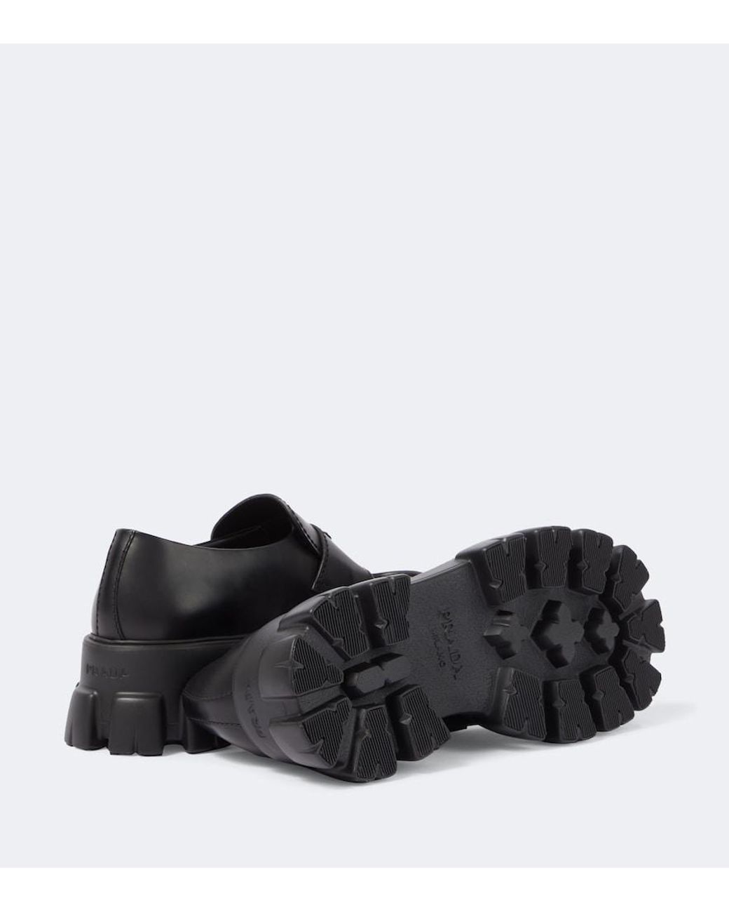 Prada Black Logo Leather Platform Loafers for men