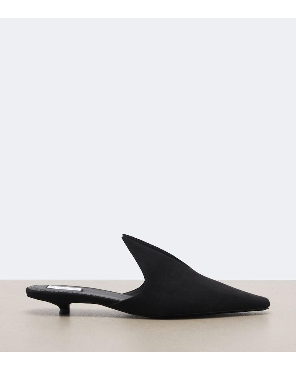 Mules di Alaïa in Black