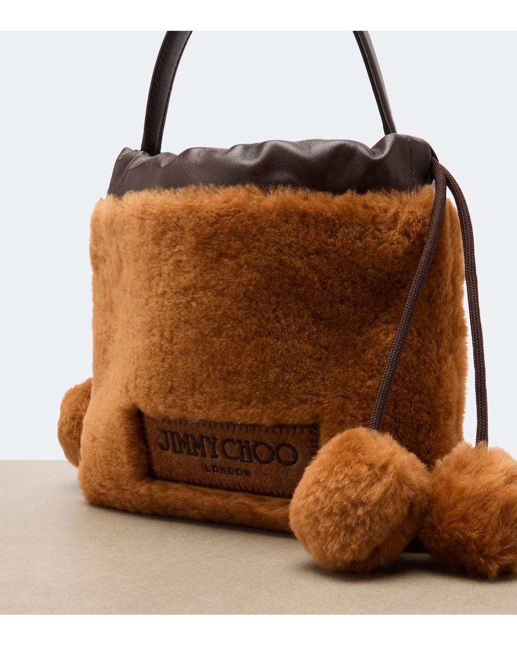 Jimmy Choo Brown Drawstring Mini Shearling Top-Handle Bag