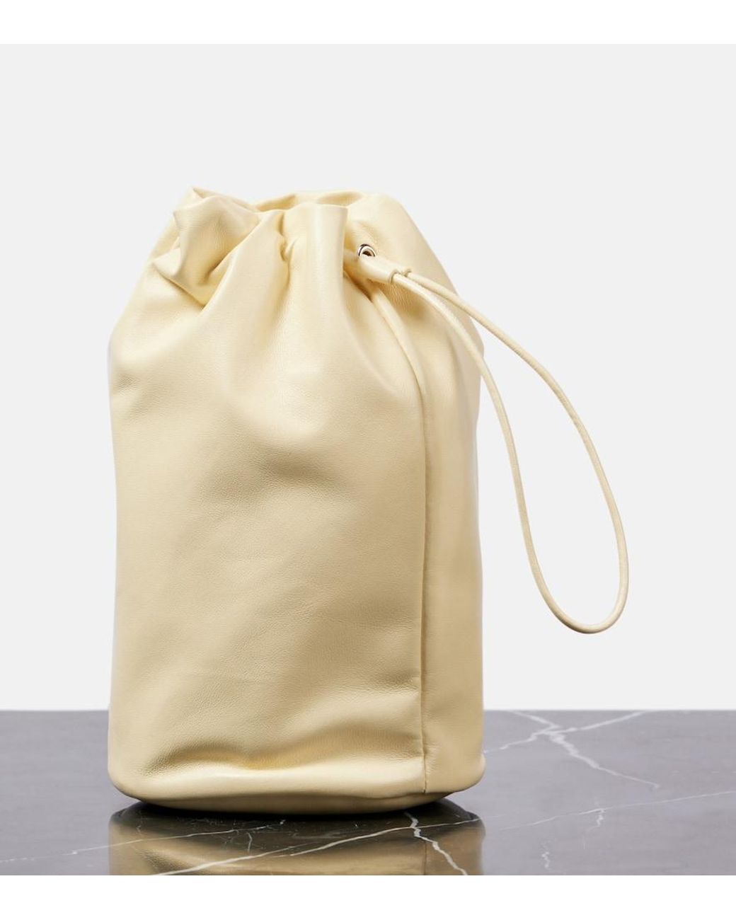 The Row Sporty Leather Pouch in Natural | Lyst