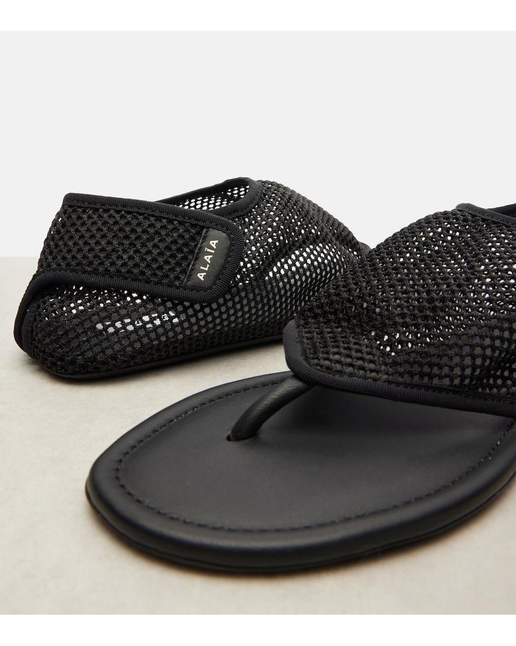 Alaïa Black Thong Fishnet Sandals