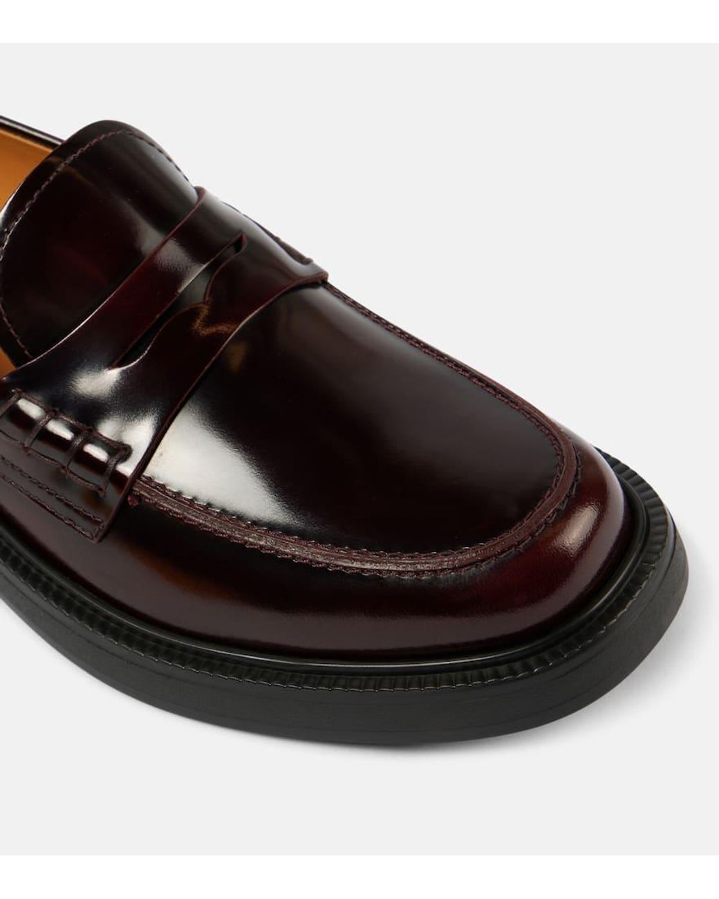 Tod's Black Leather Penny Loafers