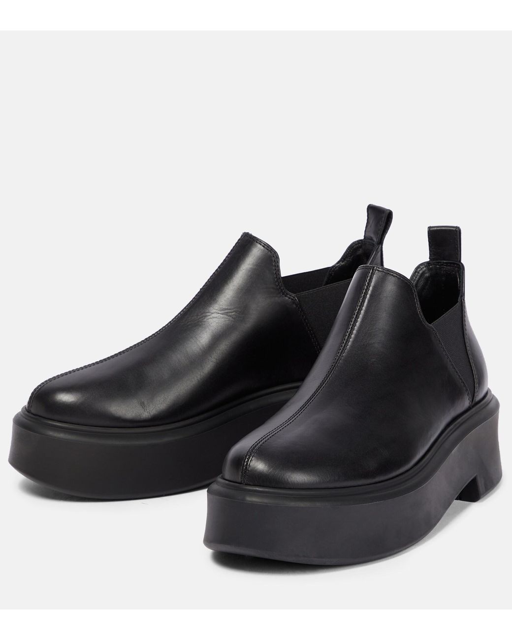 The Row Robin Leather Flatform Ankle Boots in Black | Lyst