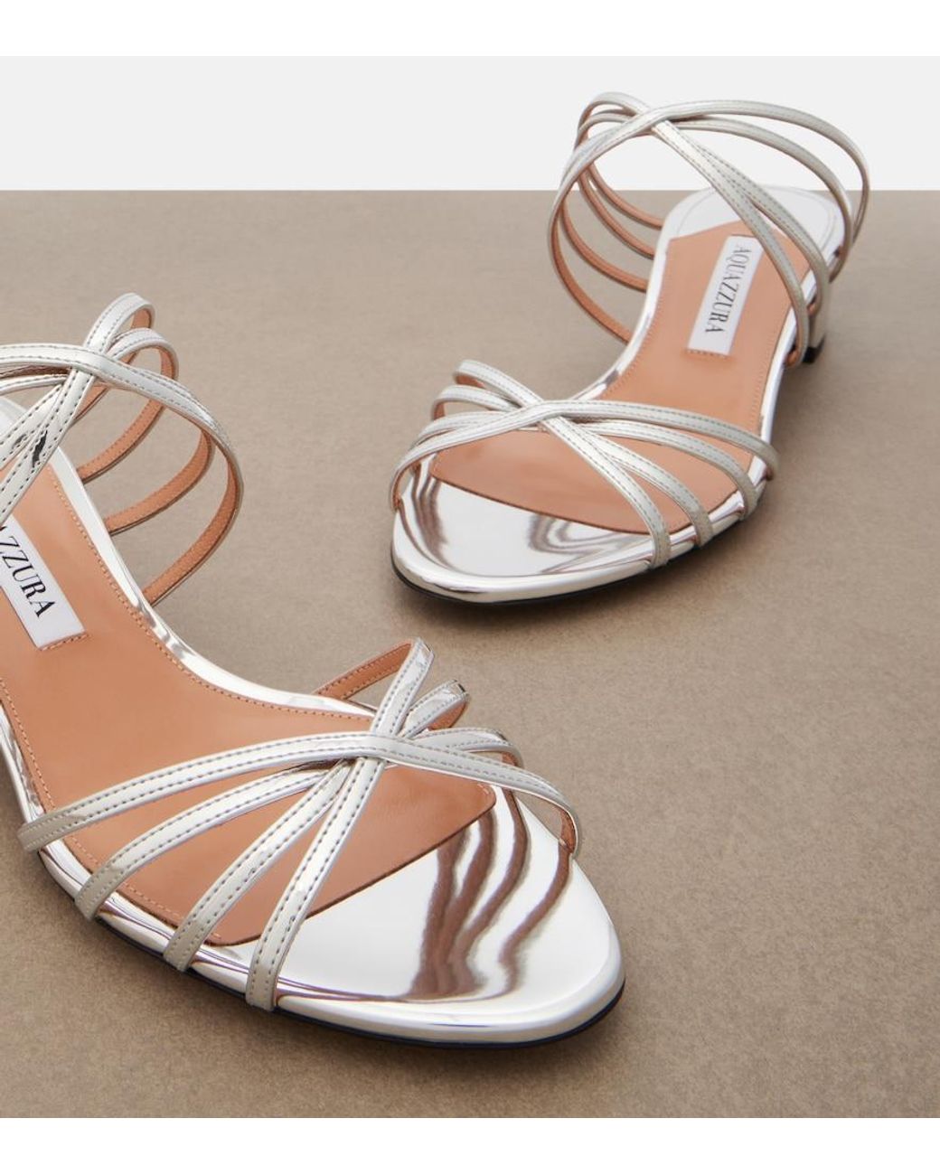 Aquazzura White Tell Me Mirrored Leather Mules
