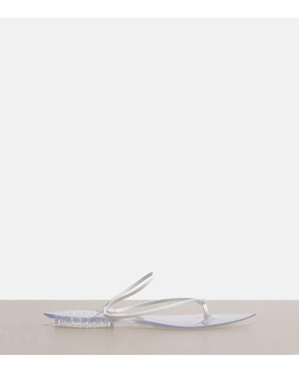 Alaïa White Invisible Leather Thong Sandals