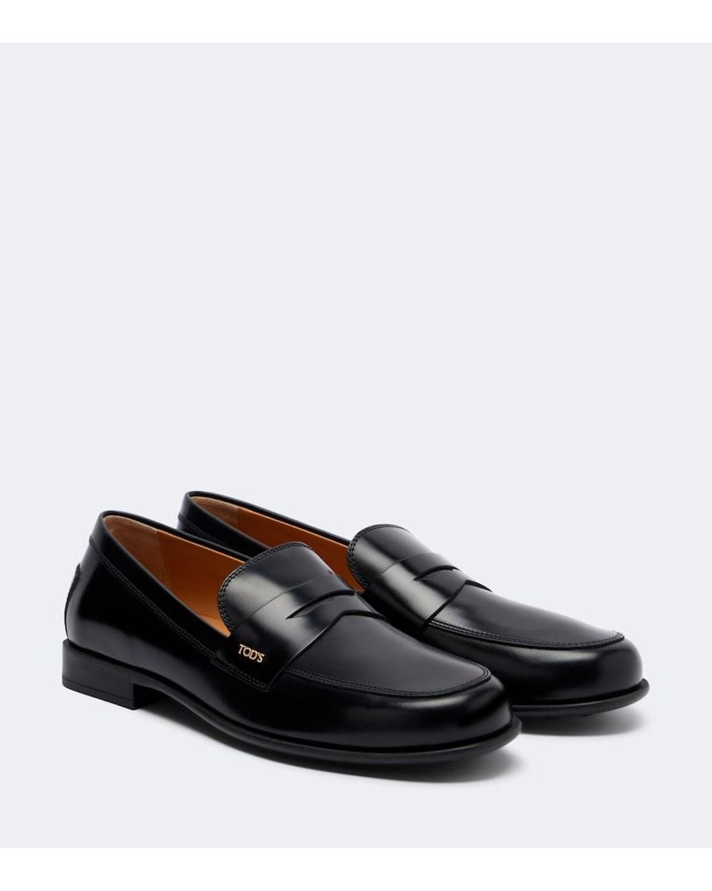 Tod's Black Leather Penny Loafers