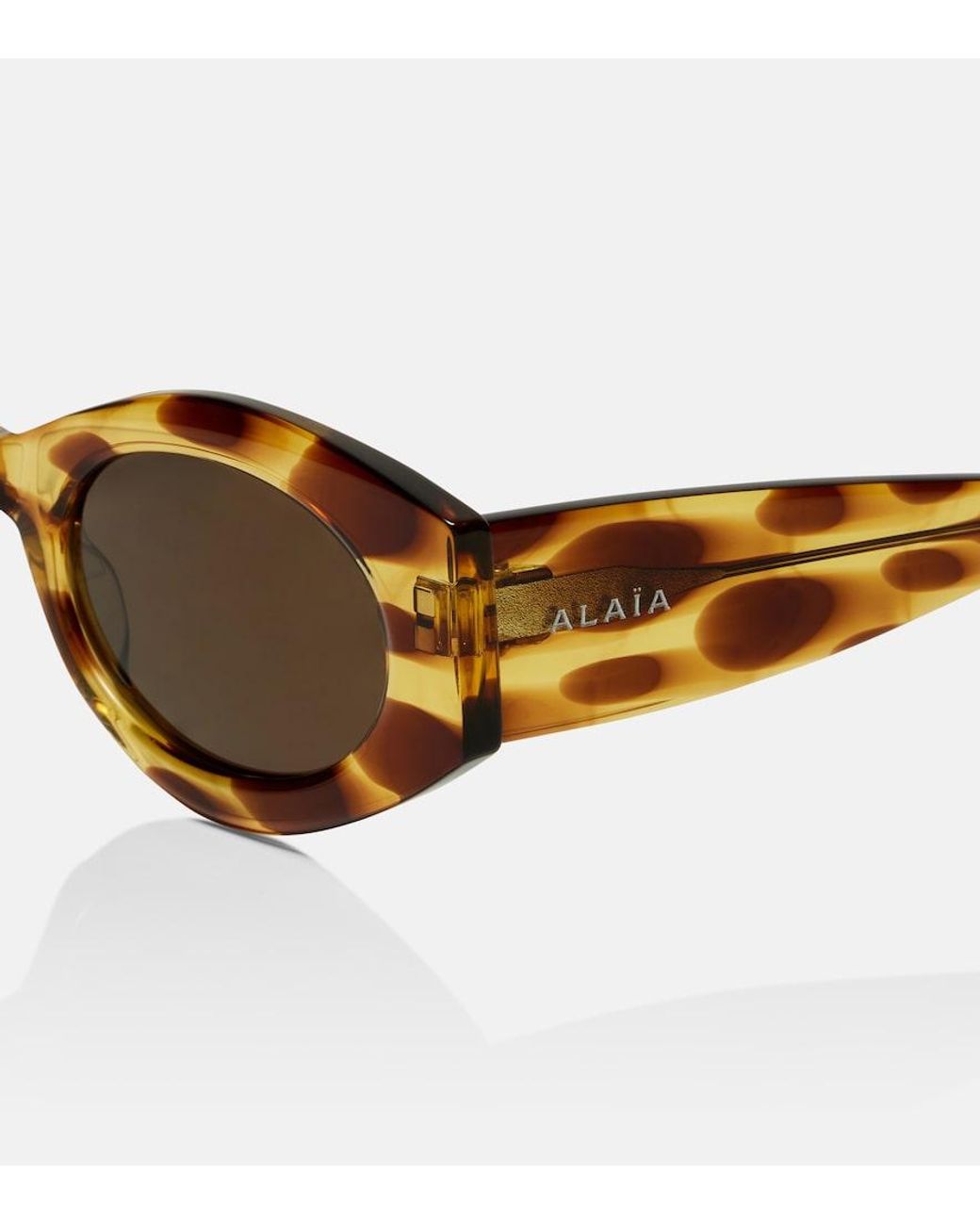 Alaïa Brown Logo Oval Sunglasses