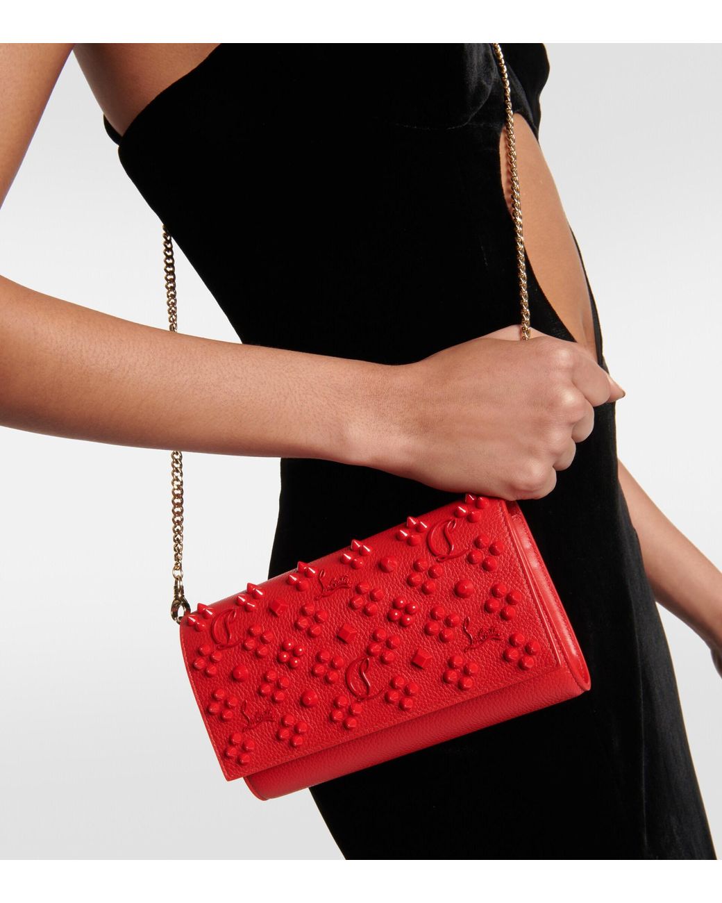 Christian Louboutin Paloma Spike-embellished Leather Clutch in Red