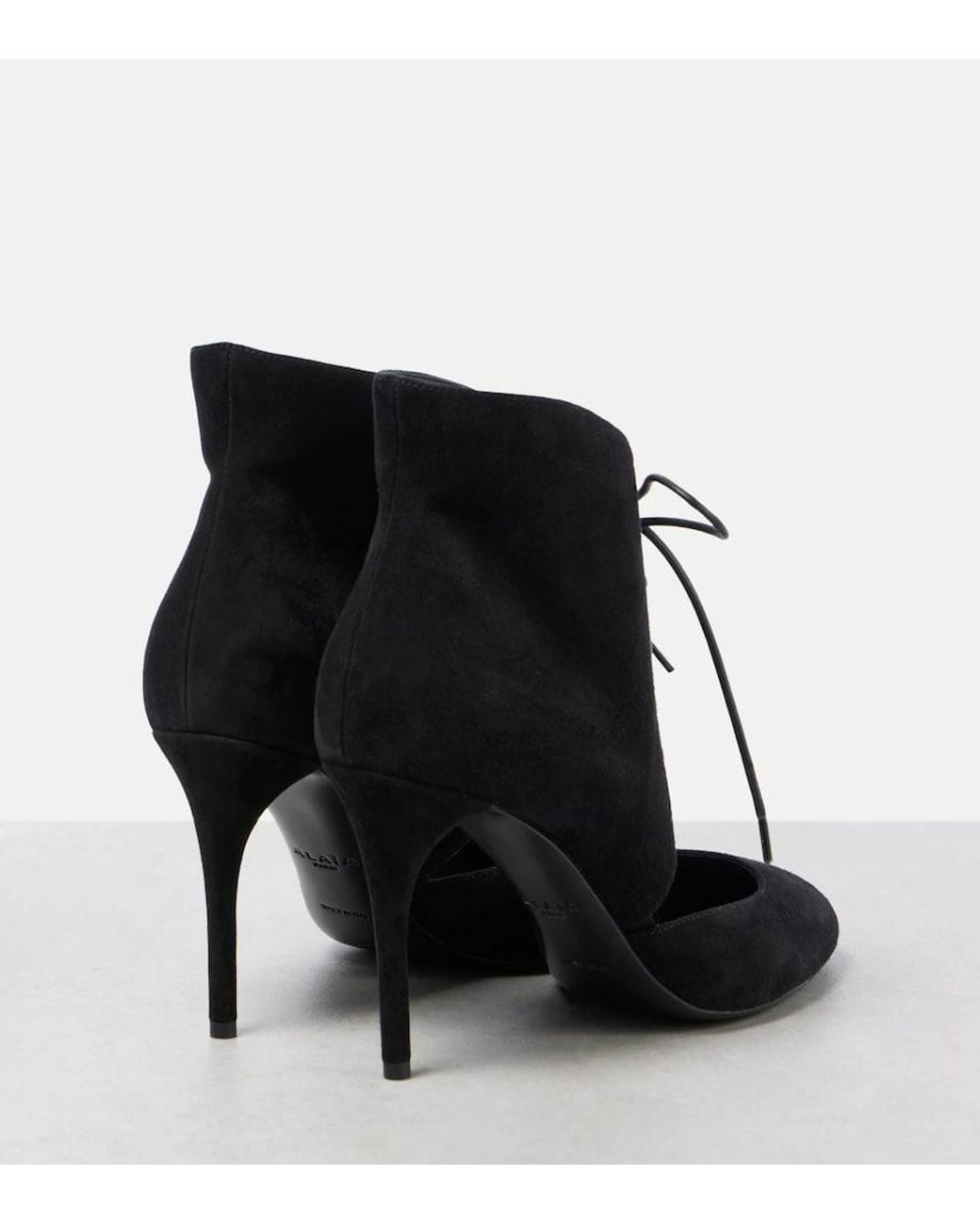 Alaïa Black Cutout Suede Ankle Boots