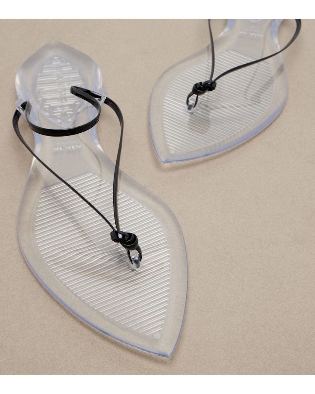 Alaïa White Invisible Leather Thong Sandals