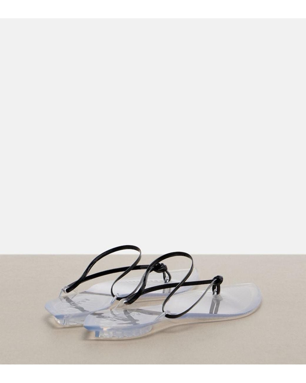 Alaïa White Invisible Leather Thong Sandals