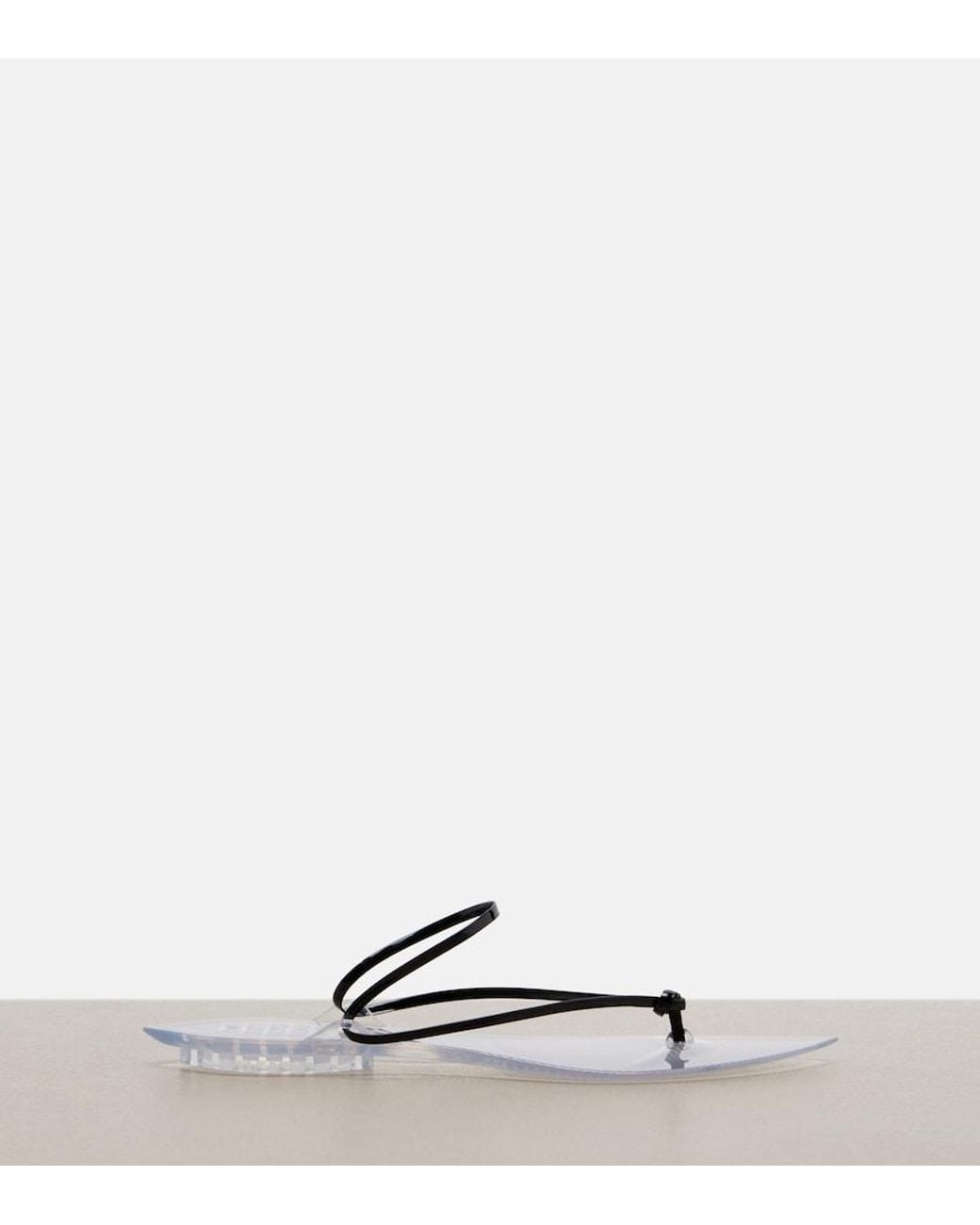 Alaïa White Invisible Leather Thong Sandals