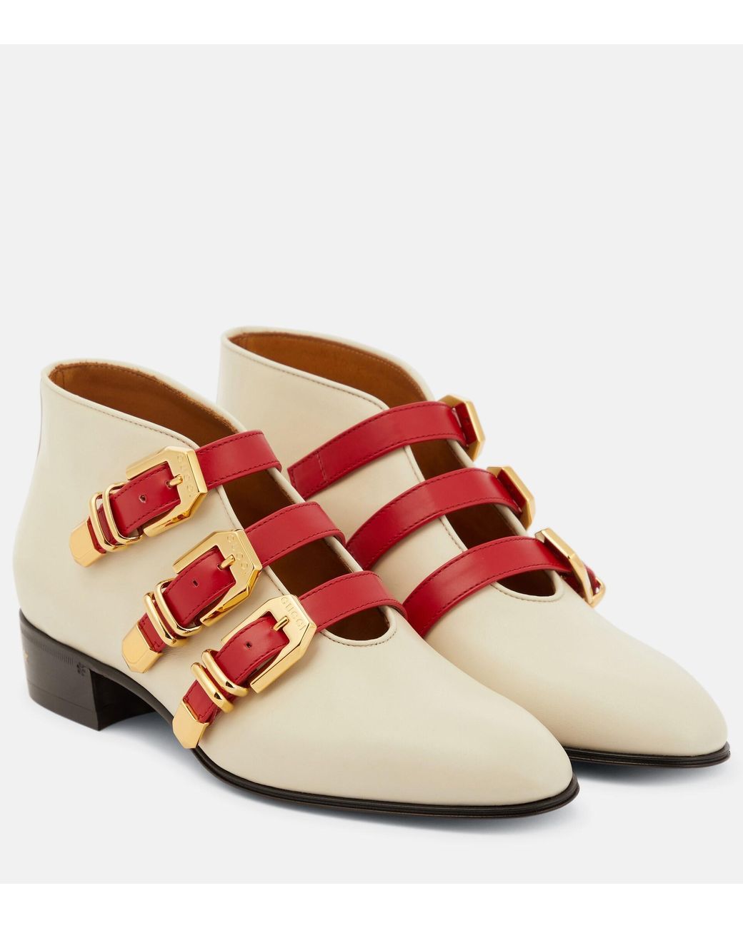Gucci Buckled Leather Ankle Boots in Pink | Lyst