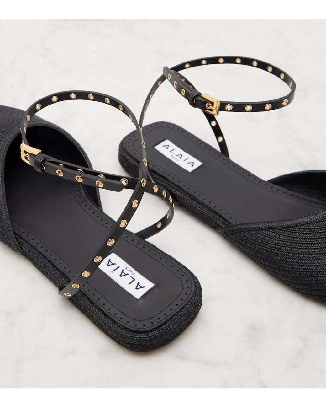 Alaïa Black Leather-Trimmed Slingback Flats