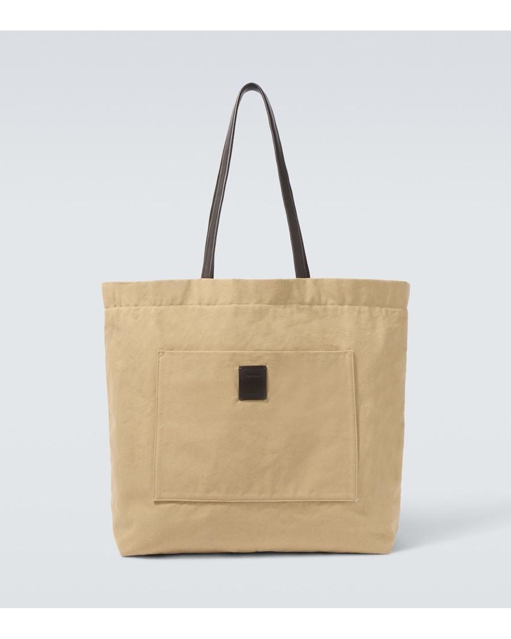 The Row Natural Tori Leather-Trimmed Canvas Tote Bag for men