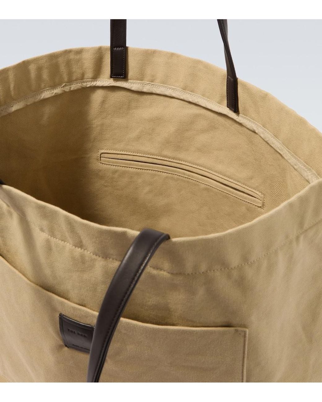 The Row Natural Tori Leather-Trimmed Canvas Tote Bag for men
