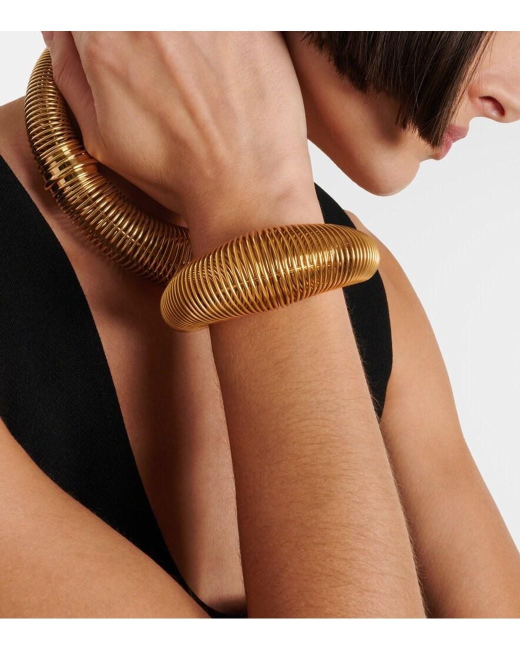 Alaïa Metallic Logo Cuff Bracelet