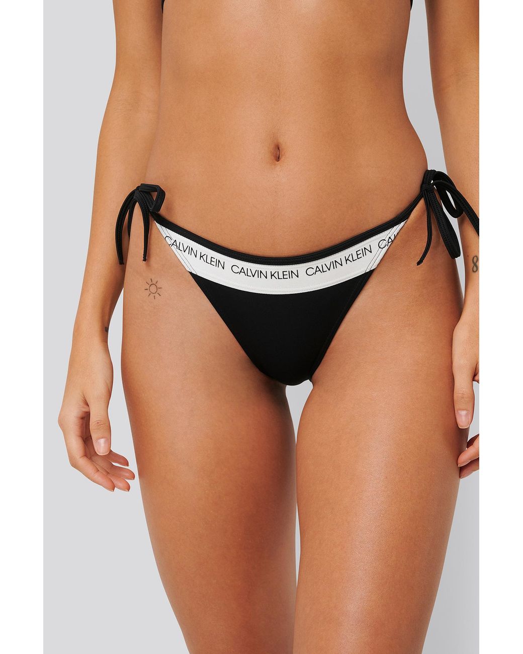 Calvin Klein Tie Side Bikini Bottom - Ck Logo in Black | Lyst UK