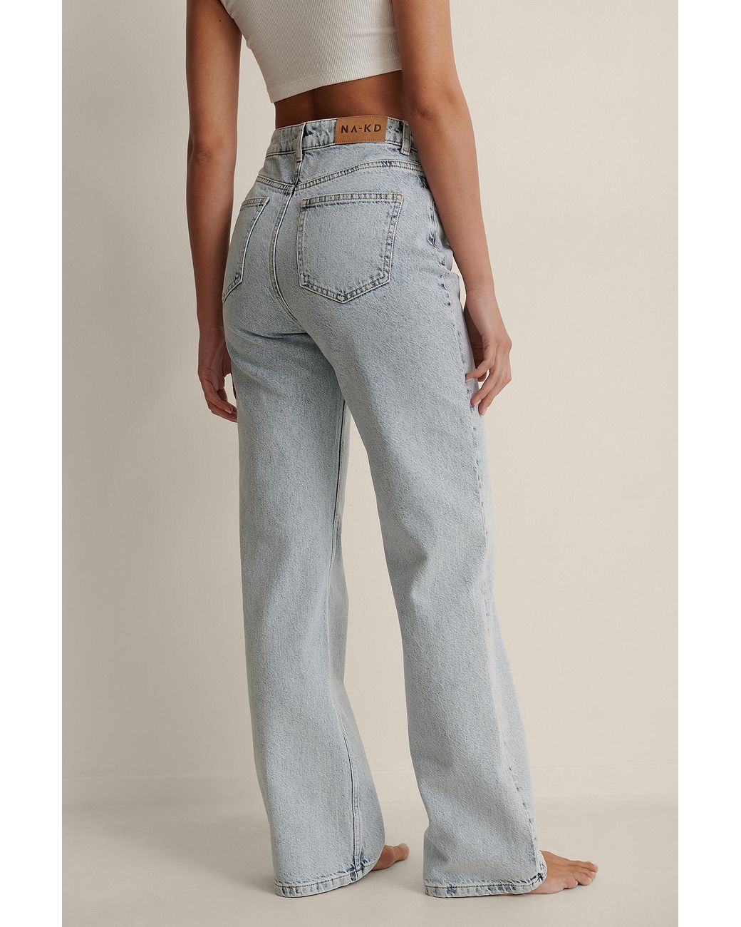 NA-KD Trend Jeans Met Wijde Pijpen En Asymmetrische Sluiting in het Blauw |  Lyst NL