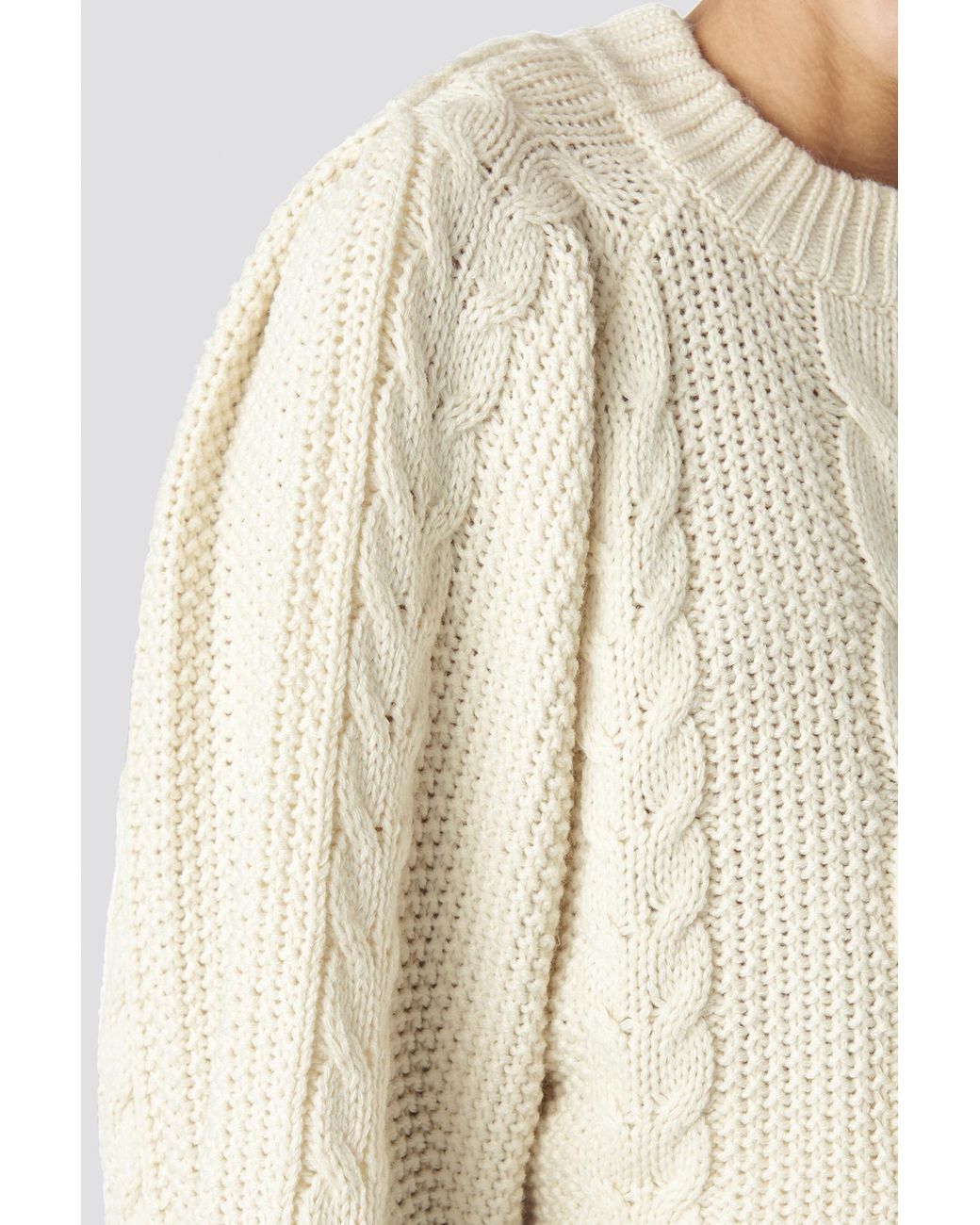 white knitted sweatshirt