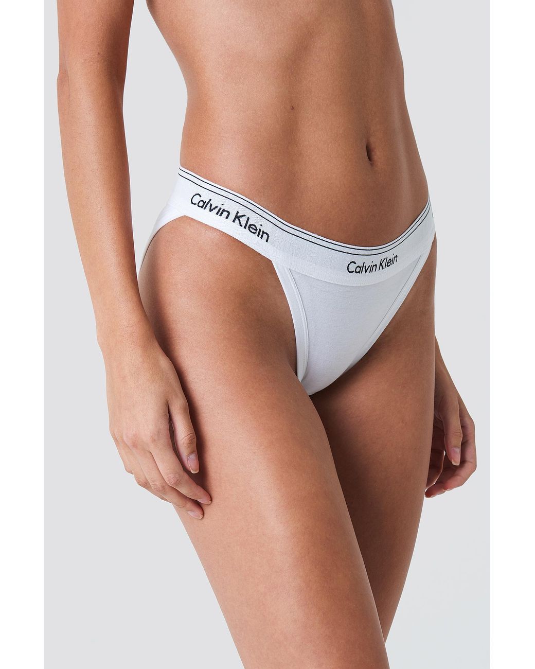 Calvin Klein Tanga High Leg Panties in White | Lyst