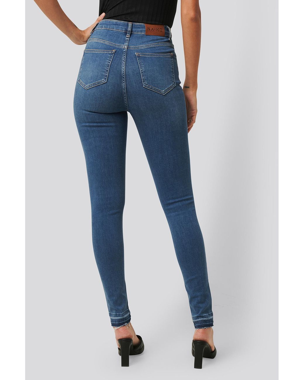 skinny high waist open hem jeans