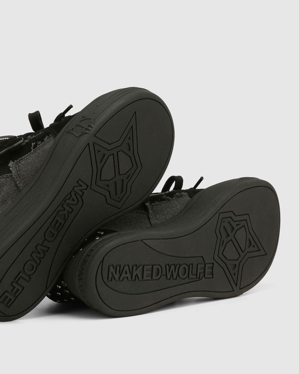 Naked Wolfe Black Damage Stud