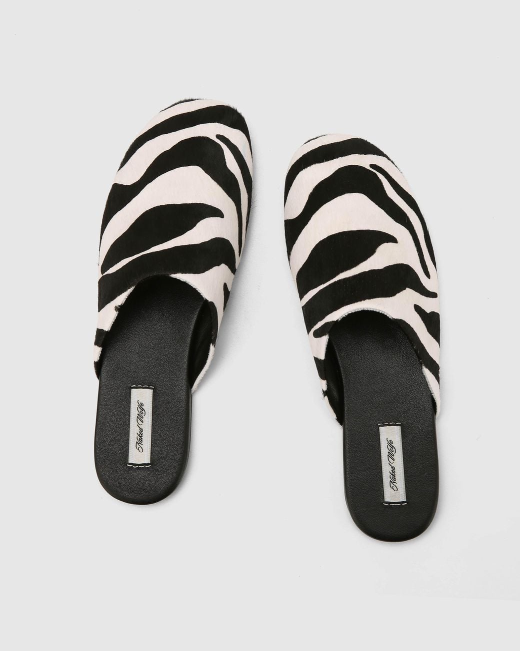 Naked Wolfe Black Bessette Zebra Pony