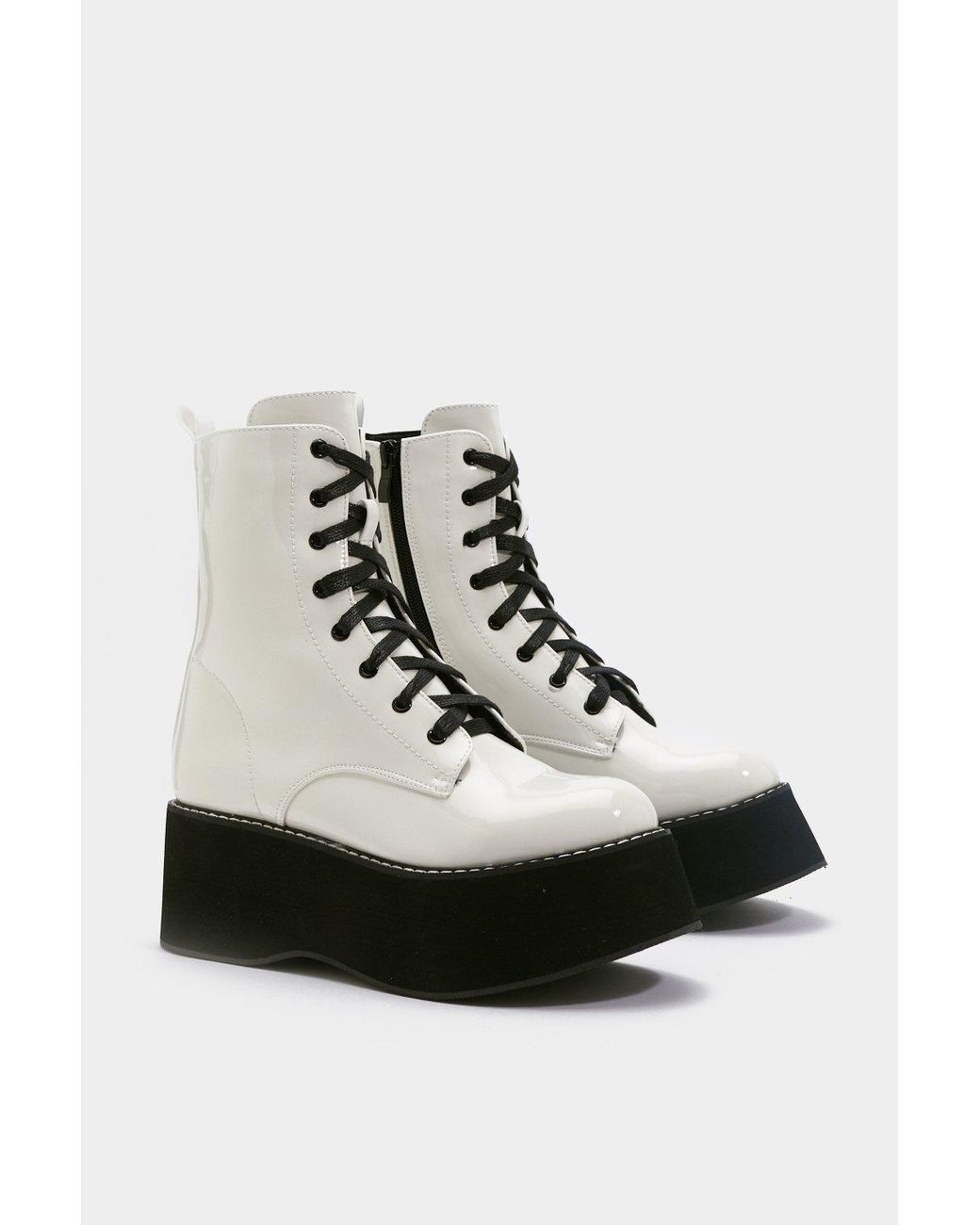 white patent platform boots