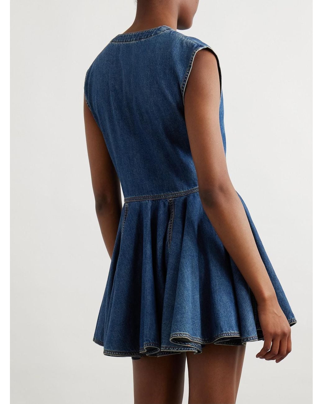 Alaa Asymmetric Wrap-Effect Denim Mini Dress in Blue | Lyst