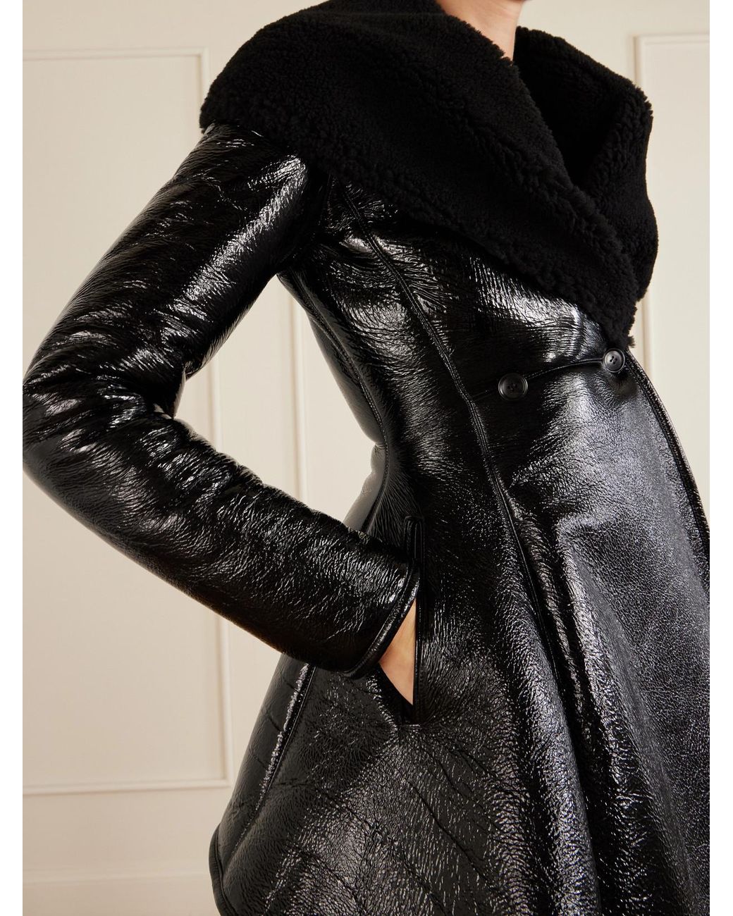 Alaïa Black Double-Breasted Paneled Shearling-Trimmed Glossed-Leather Coat