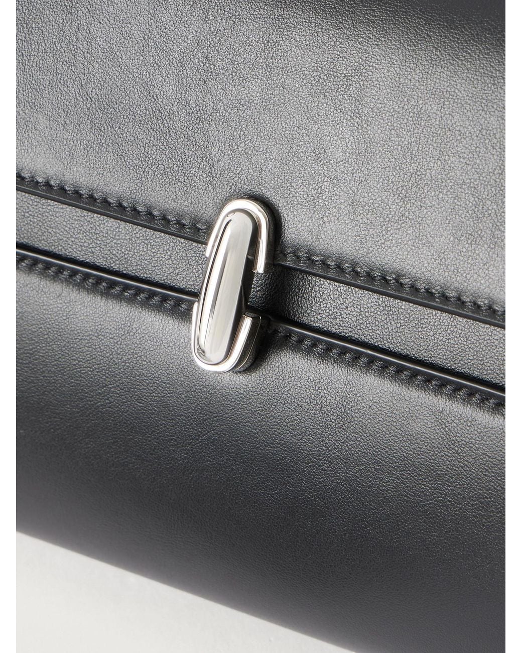 SAVETTE Black Symmetry Trapeze Pochette Leather Top-Handle Bag