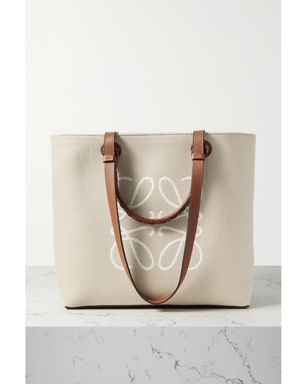 Anagram small debossed textured-leather tote