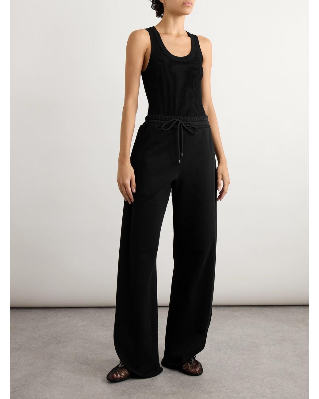 Alaïa Black Petal Cotton-Jersey Barrel-Leg Track Pants