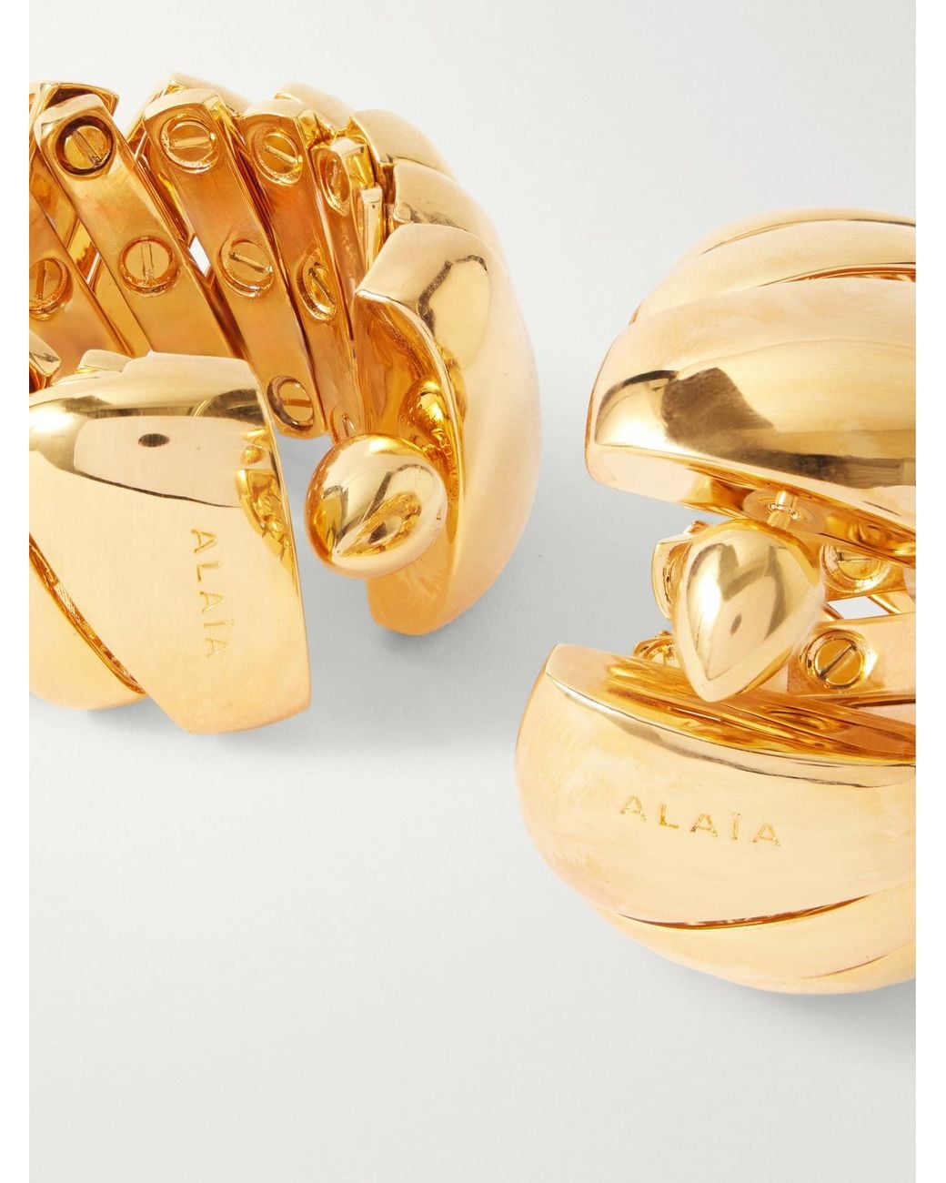 Alaïa Metallic Tone Hoop Earrings