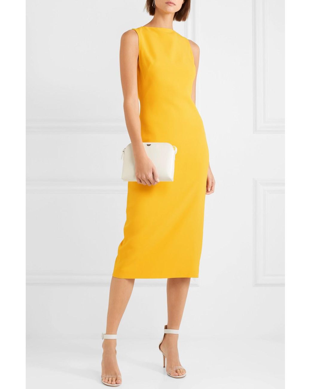 https://cdna.lystit.com/1040/1300/n/photos/net-a-porter/92b95f09/brandon-maxwell-bright-yellow-Crepe-Midi-Dress.jpeg