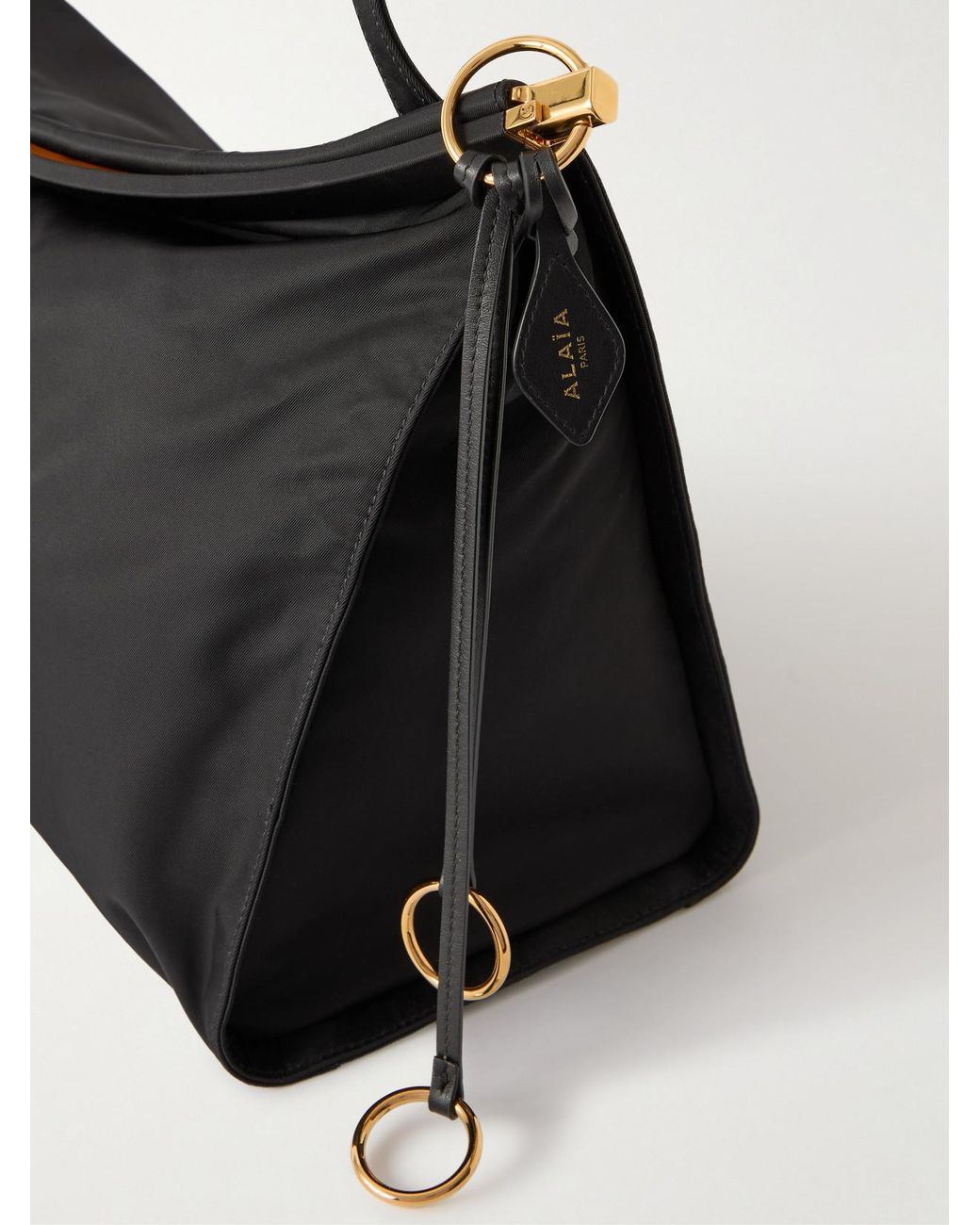 Alaïa Black Click E/W Large Leather-Trimmed Shell Shoulder Bag