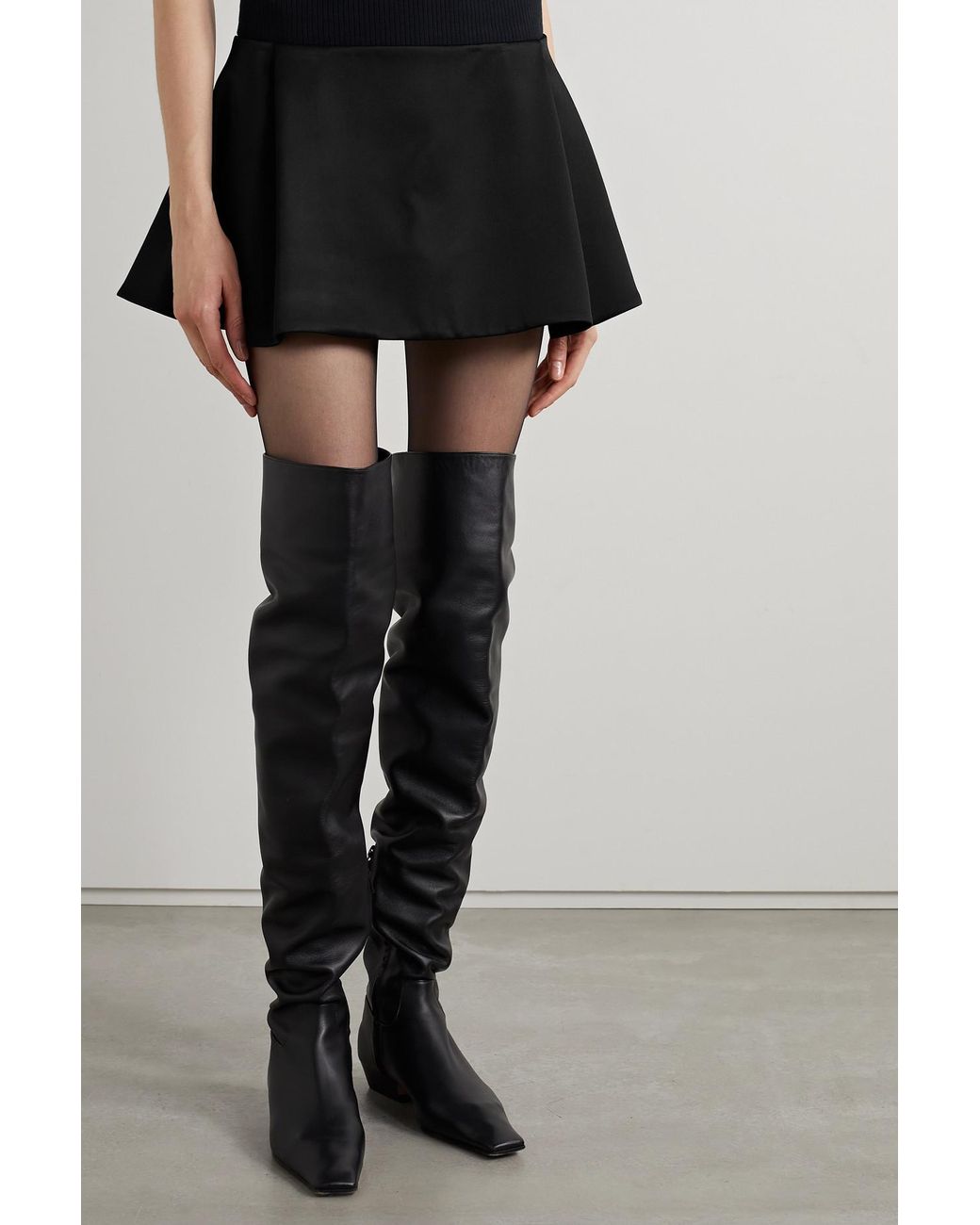 Mini skirt and shop over the knee boots