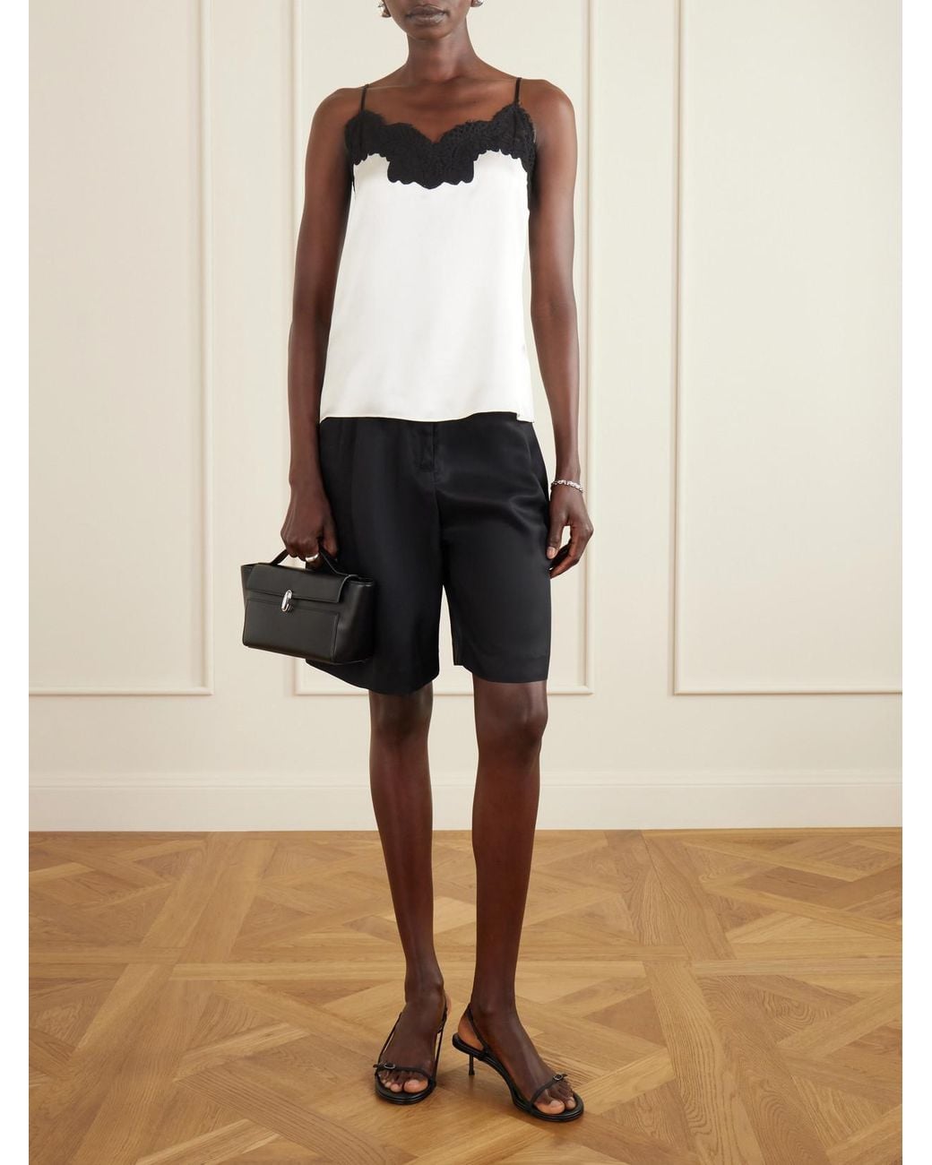 SAVETTE Black Symmetry Trapeze Pochette Leather Top-Handle Bag