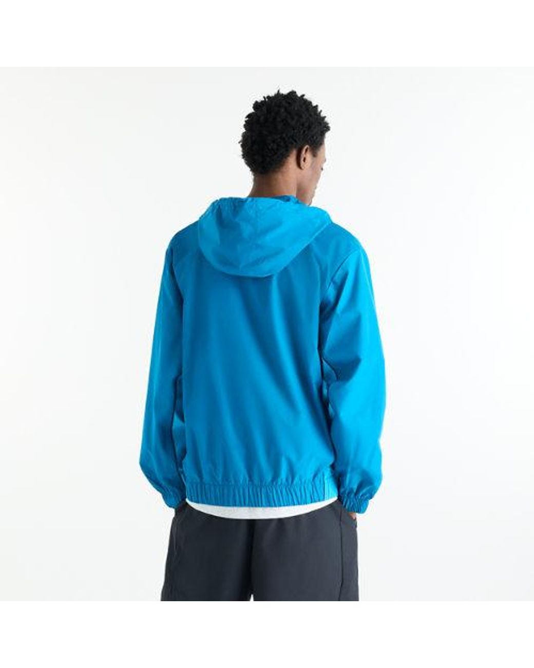 New Balance Blue Sport Linear Graphic Woven Jacket for men