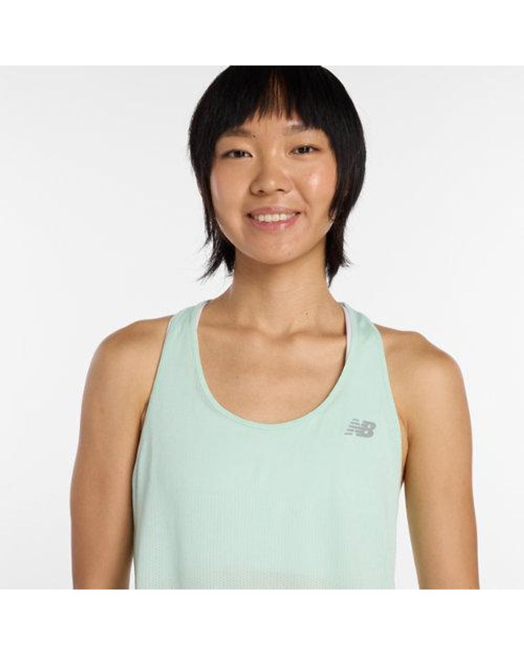 New Balance Rc Essential Tank In Blue Lyst UK