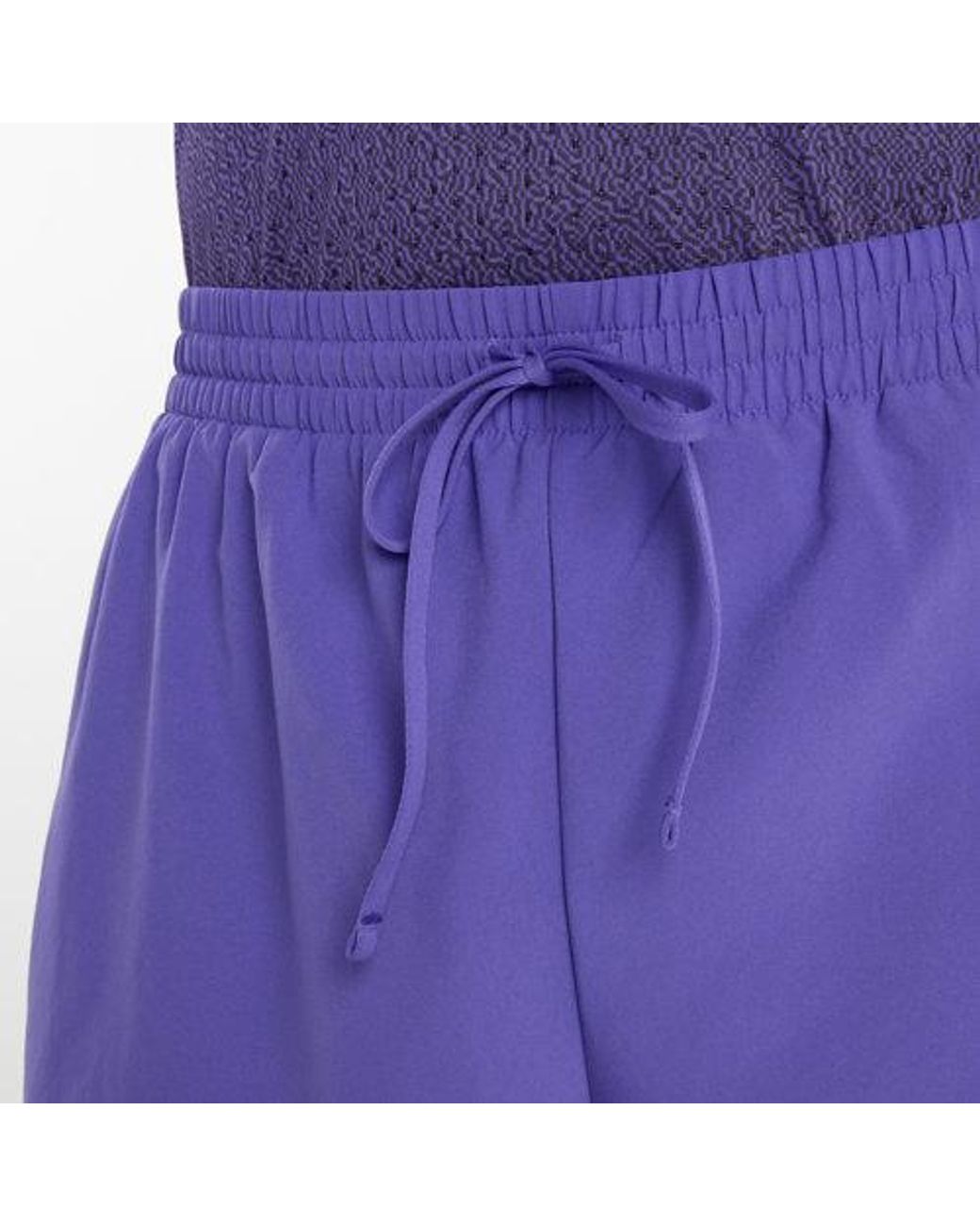 New Balance Purple Sport Essential Short 7" for men