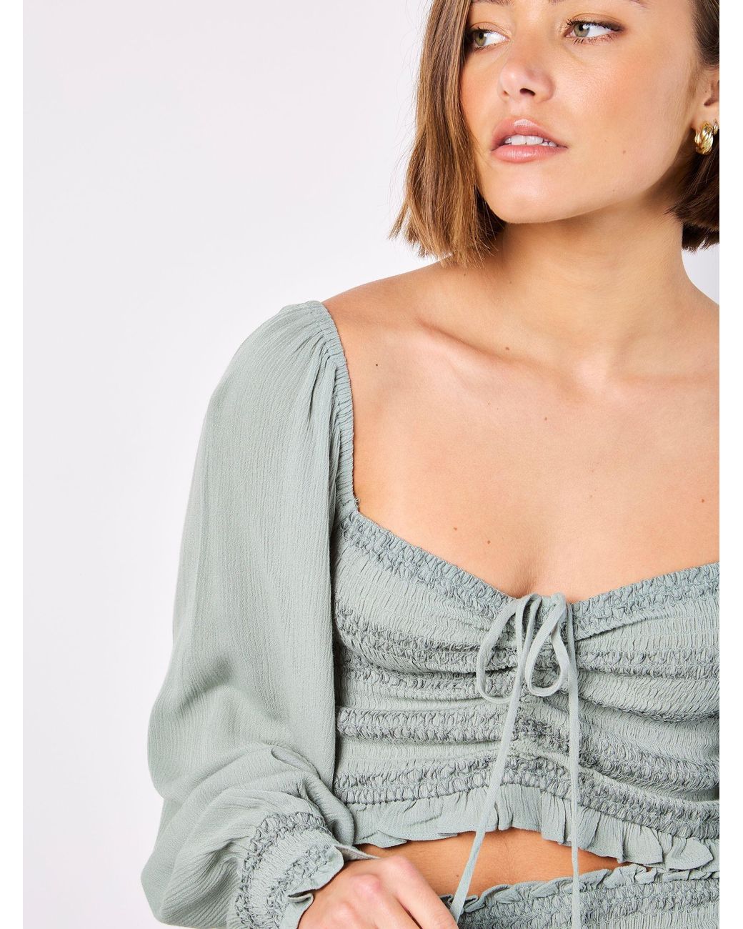Apricot Gray Smocked Tassel Crop Long Sleeve Blouses
