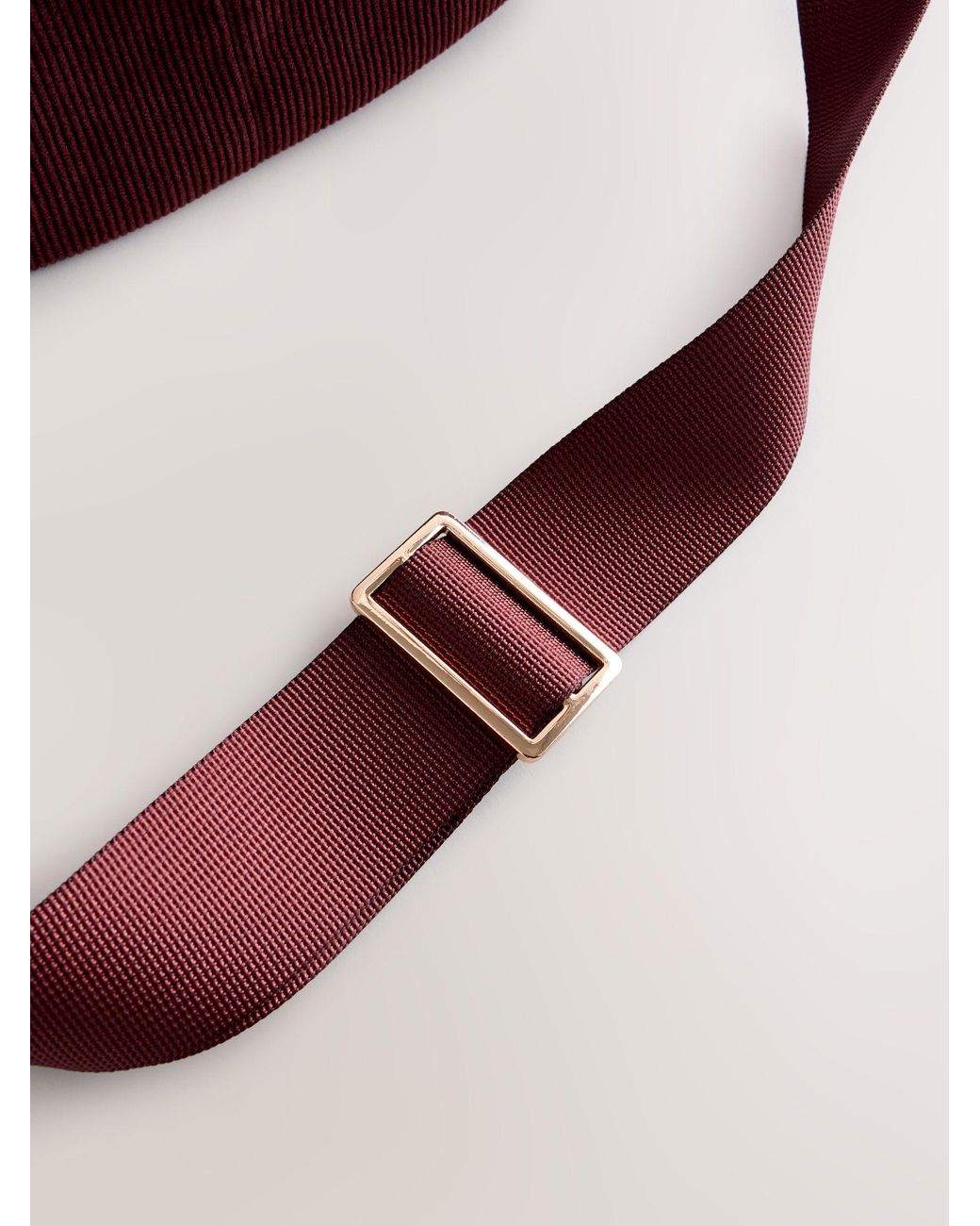 Next Purple Rust Sling Bag