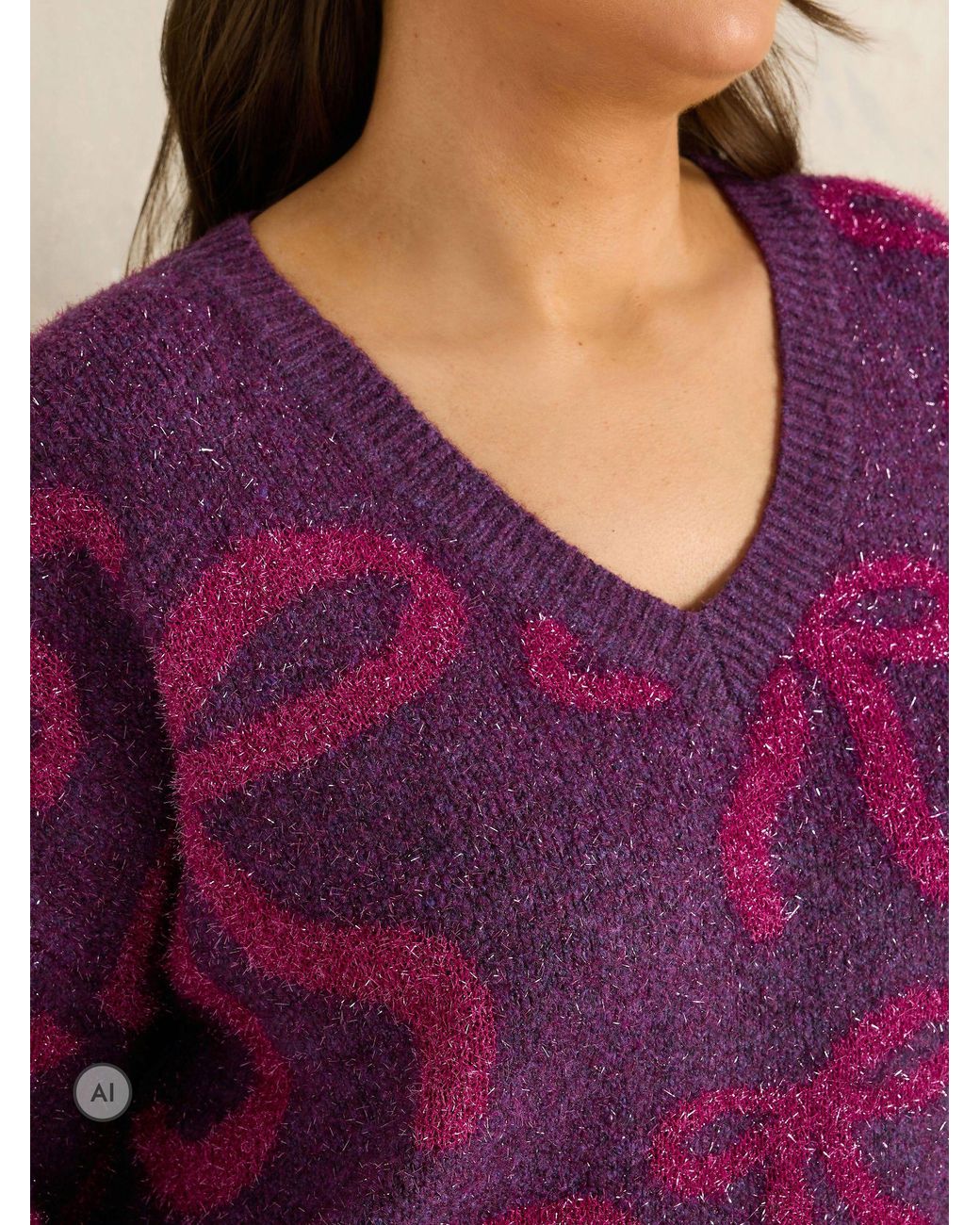 Evans Purple Sparkle Bow Pattern Jumper