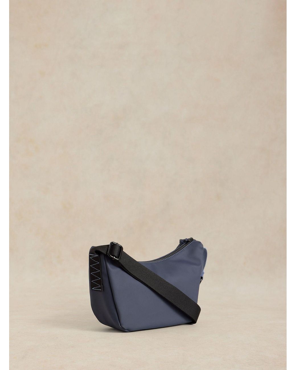 White Stuff Dark Alex Rubberised Cross-Body Bag in Blue | Lyst