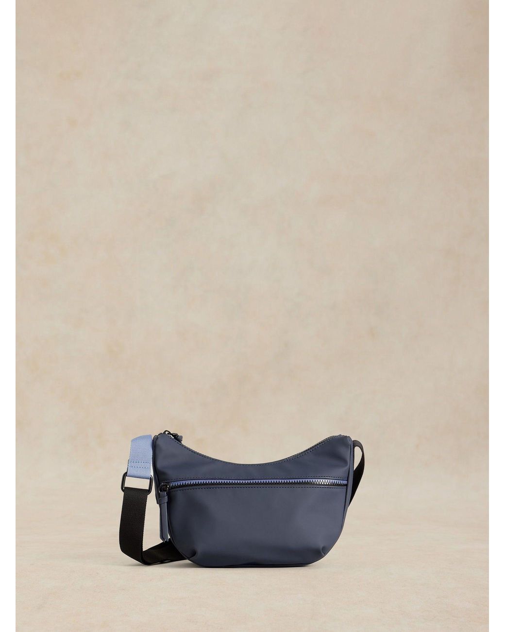 White Stuff Dark Alex Rubberised Cross-Body Bag in Blue | Lyst