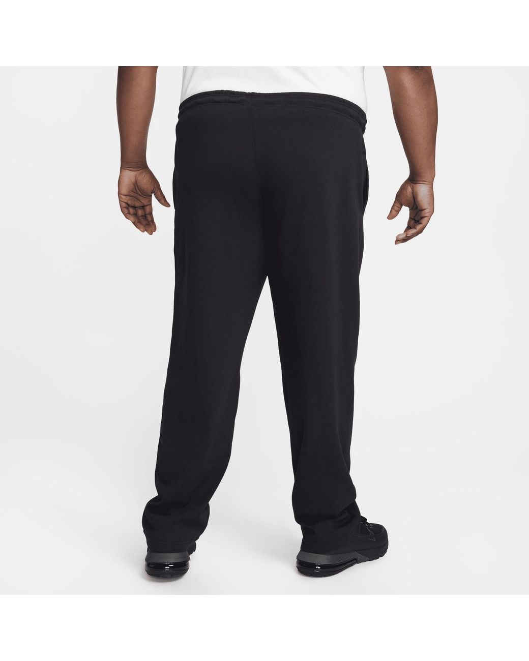 nike open hem club pants