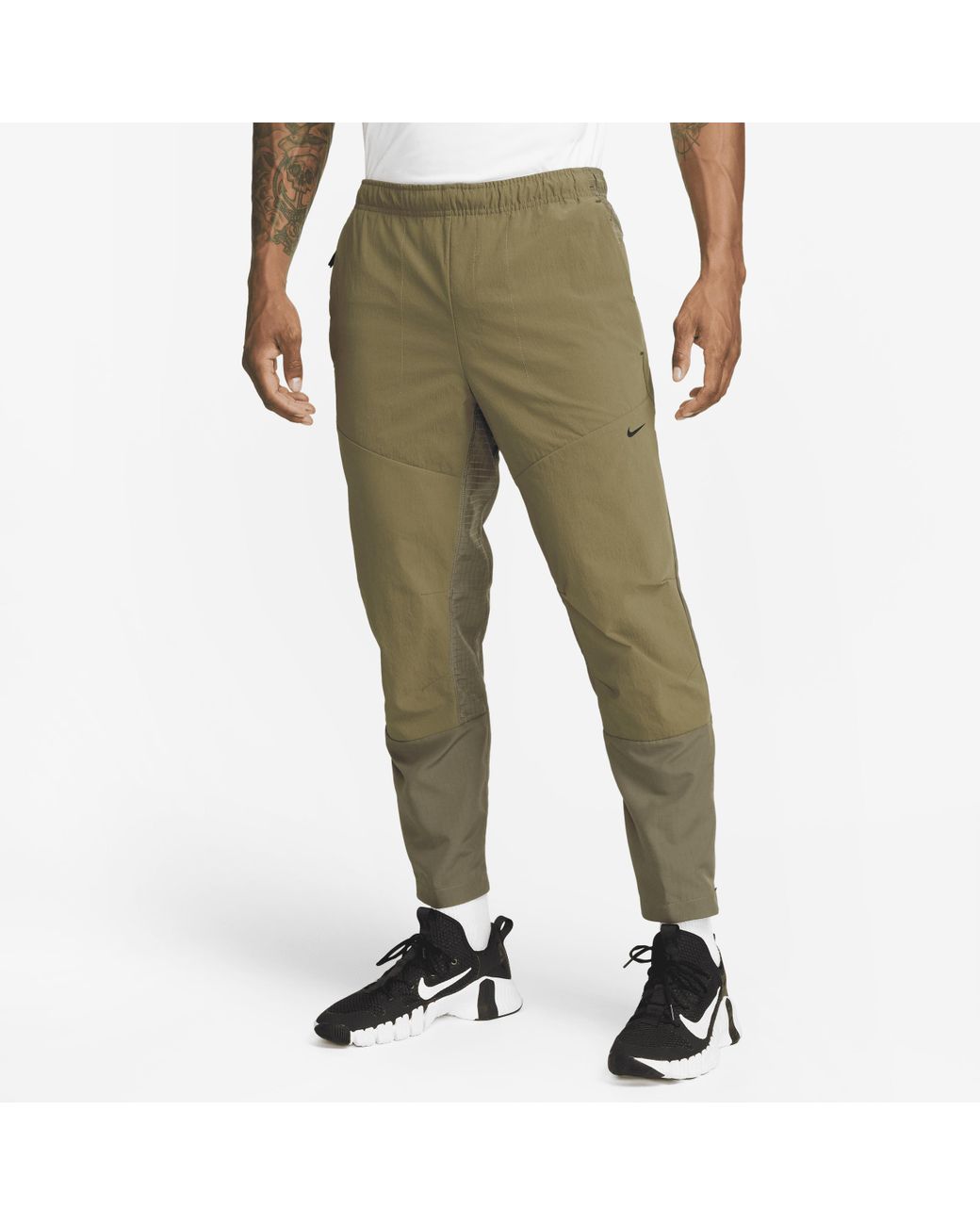 Nike A.p.s. Dri-fit Adv Woven Versatile Pants in Green for Men